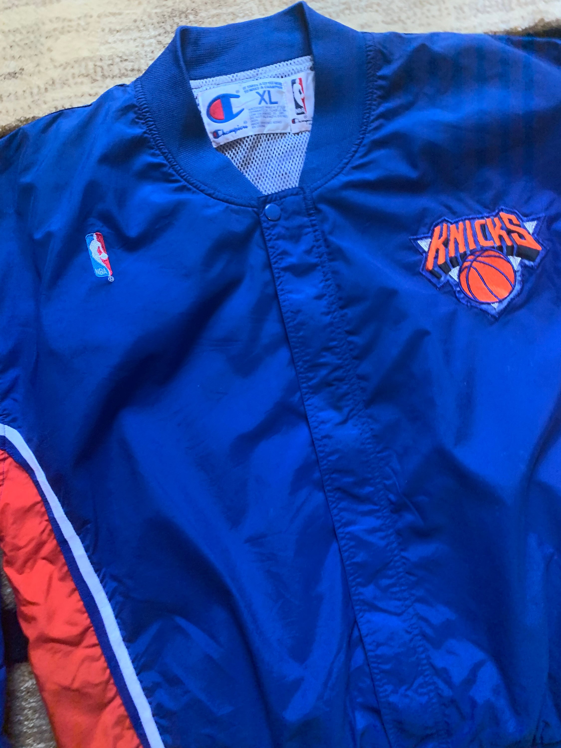 KNICKS 🗽 . . . Just added to the website ! Vintage 90s Champion New York Knicks  Warm Up Jacket Size Medium (23.5x26.5) Minor blemishes to …