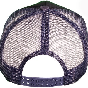 May include: Black mesh trucker hat with a black front panel and a black adjustable strap.