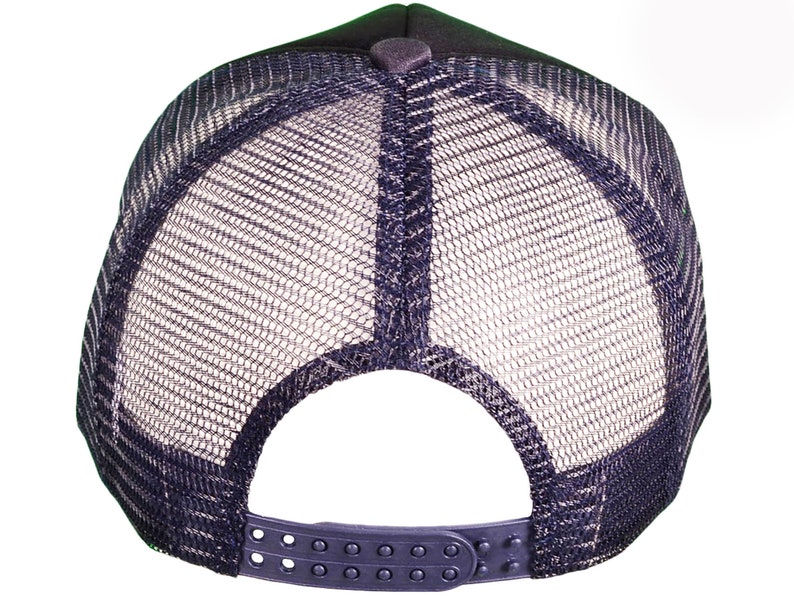 May include: Black mesh trucker hat with a black front panel and a black adjustable strap.