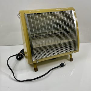 General Electric Floor Space Heater 750/1500 Watts Four-Leg Free Standing Heater