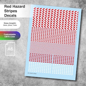 May include: A sheet of red and white hazard stripe decals. The decals are arranged in various patterns and sizes, with heights of 3mm, 2mm, and 1mm. The text "Red Hazard Stripes Decals" is at the top. The decals are customizable CMYK color.