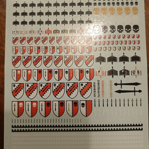 Daemon Hunter Knights Pre-cut Waterslide Transfer Decals Compatible with 28 mm tabletop miniatures of marines in space.