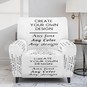 May include: White armchair with black text that reads "CREATE YOUR OWN DESIGN" and "Any font, Any Color, Any design." The text is repeated on the seat and arms. The chair has black legs.