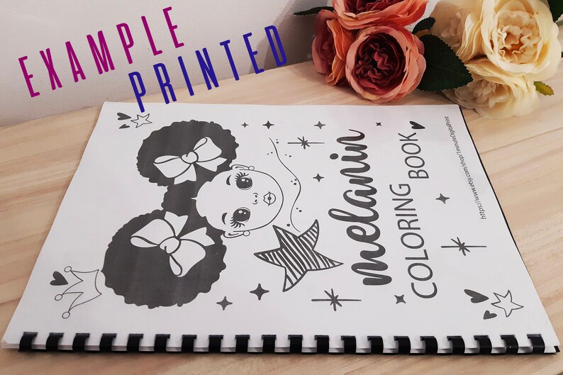 Op de afbeelding: Een zwart-wit kleurboek met een omslag waarop een meisje met krullend haar en een strik te zien is. De titel van het boek is "melanin coloring book".