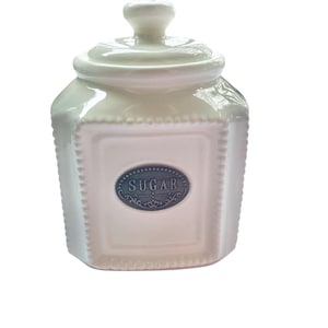 May include: A set of three ceramic mugs with a speckled, matte finish. The mugs are in shades of cream, light gray, and dark gray. Each mug has a simple, minimalist design, perfect for coffee or tea.