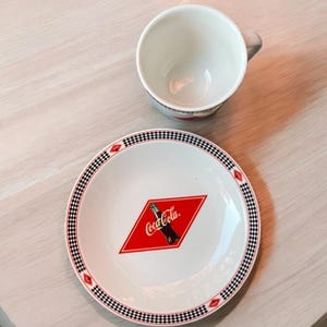 4-Piece Coca-Cola Snack Set 2  Luncheon Plates, 2 Mugs, Coca Coke Memorabilia With Iconic Coke Logo,  Black Diamond by Gibson 2000