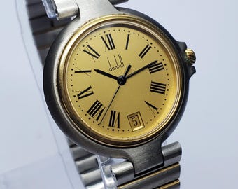 Reloj de vestir Dunhill Classic Swiss Quartz bicolor, 31 mm, de los años 80 a los 90, en funcionamiento.