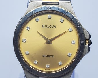 Reloj unisex Bulova Diamond Quartz vintage, 30 mm, década de 1980, en funcionamiento.