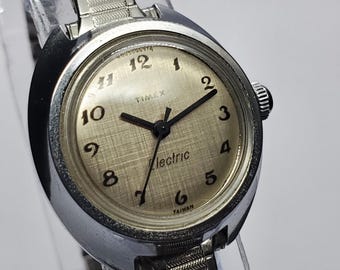 Reloj Timex UFO Electric Electro Mechanic vintage, 25 mm, 1974, en funcionamiento.