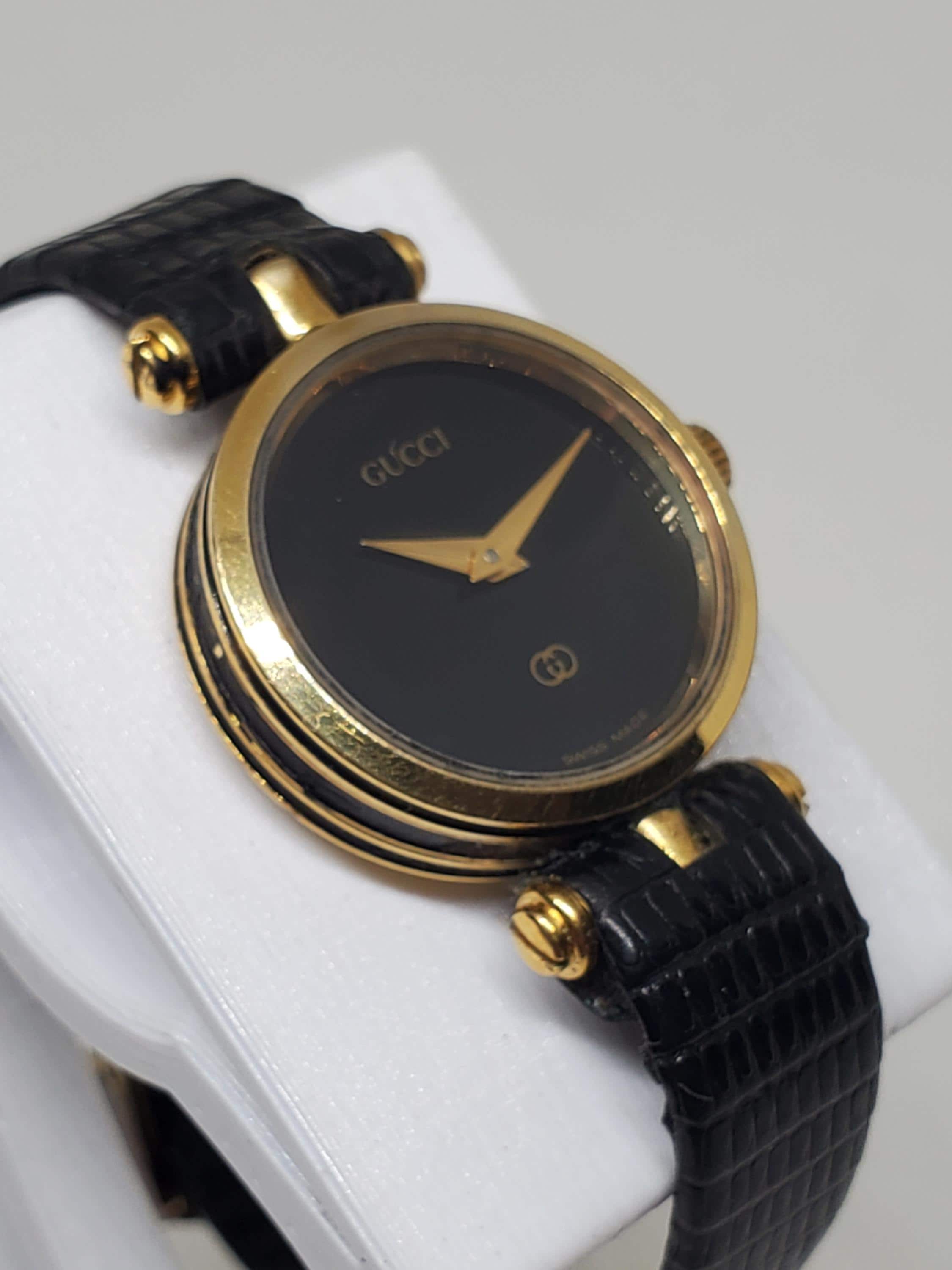 Gucci Sherry Line 2000L Gold Plated Black Dial Swiss Quartz Dress