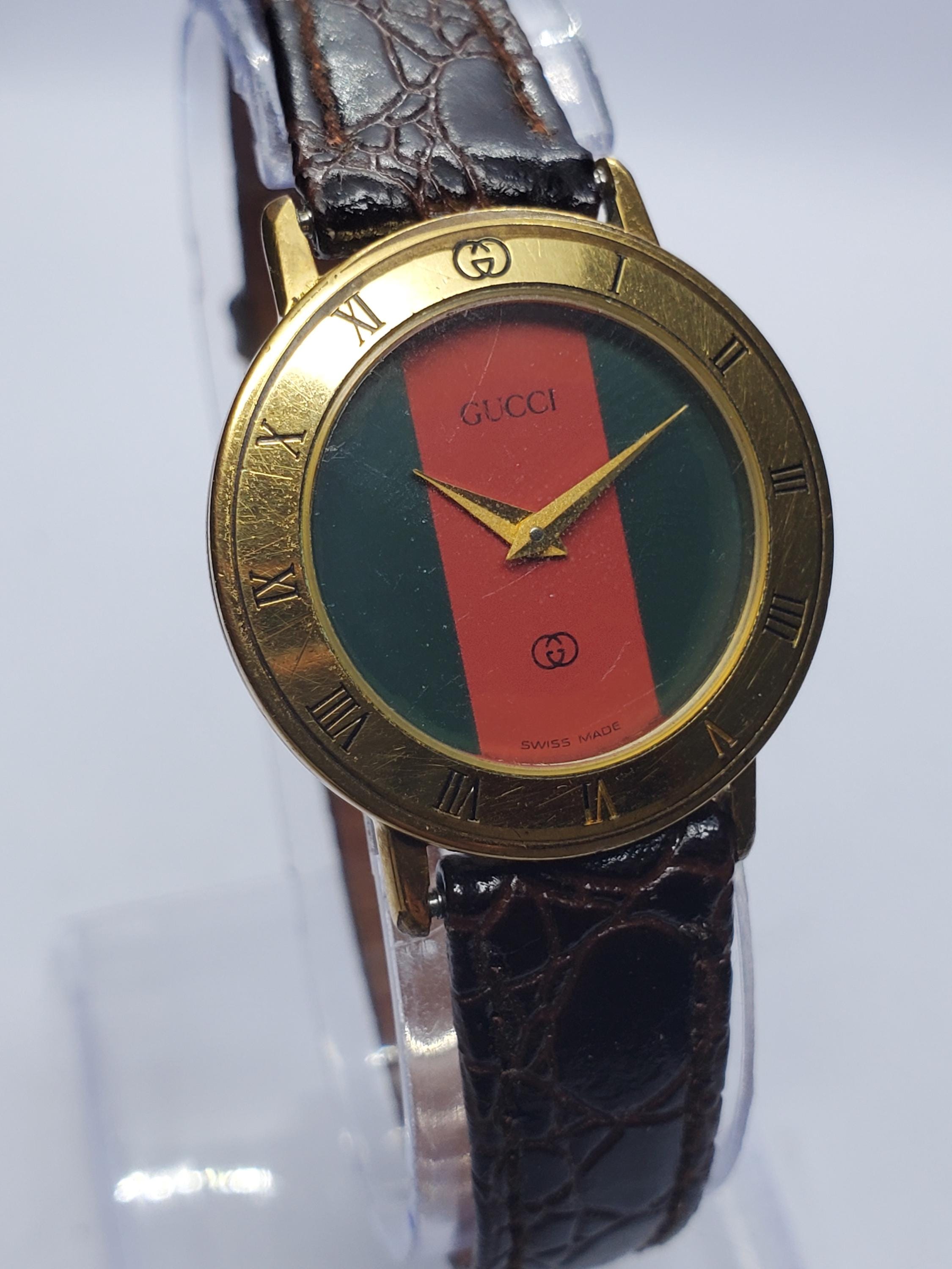 Gucci gold vintage watch - Etsy 日本