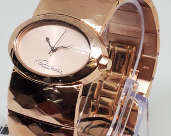Reloj Roberto Cavalli tono oro rosa, nuevo, envuelto en caja, funcionando.