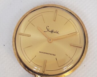 Vintage Womens Sheffield Swiss Made Gold Tone Pocket Watch  display picture 3