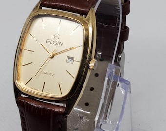Reloj de vestir Elgin Quartz FC826 vintage color oro con fecha – Elegancia retro clásica, década de 1980, en funcionamiento