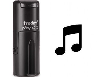 May include: Black self-inking stamp with the text "trodat printy 4612" and a musical note symbol.