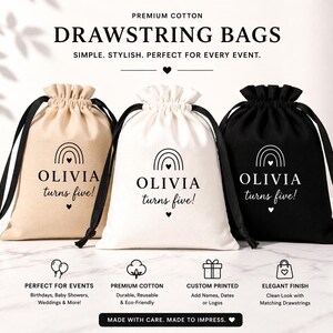May include: Three drawstring bags in beige, white, and black, each with a black drawstring. The bags feature a rainbow design and the text "OLIVIA turns five!" in a stylish font. The bags are made of premium cotton.