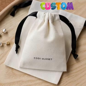 Lot de 20/30/100 impression de logo personnalisé, sacs à poussière en coton personnalisés, sac d'emballage de bijoux, pochettes chics à cordon, petit sac en coton de qualité supérieure
