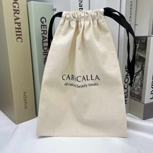Lot de 20/30/50/100 logo personnalisé imprimé, sacs à poussière personnalisés en coton noir, sac d'emballage de bijoux, pochettes à cordon, petit sac en coton de qualité supérieure