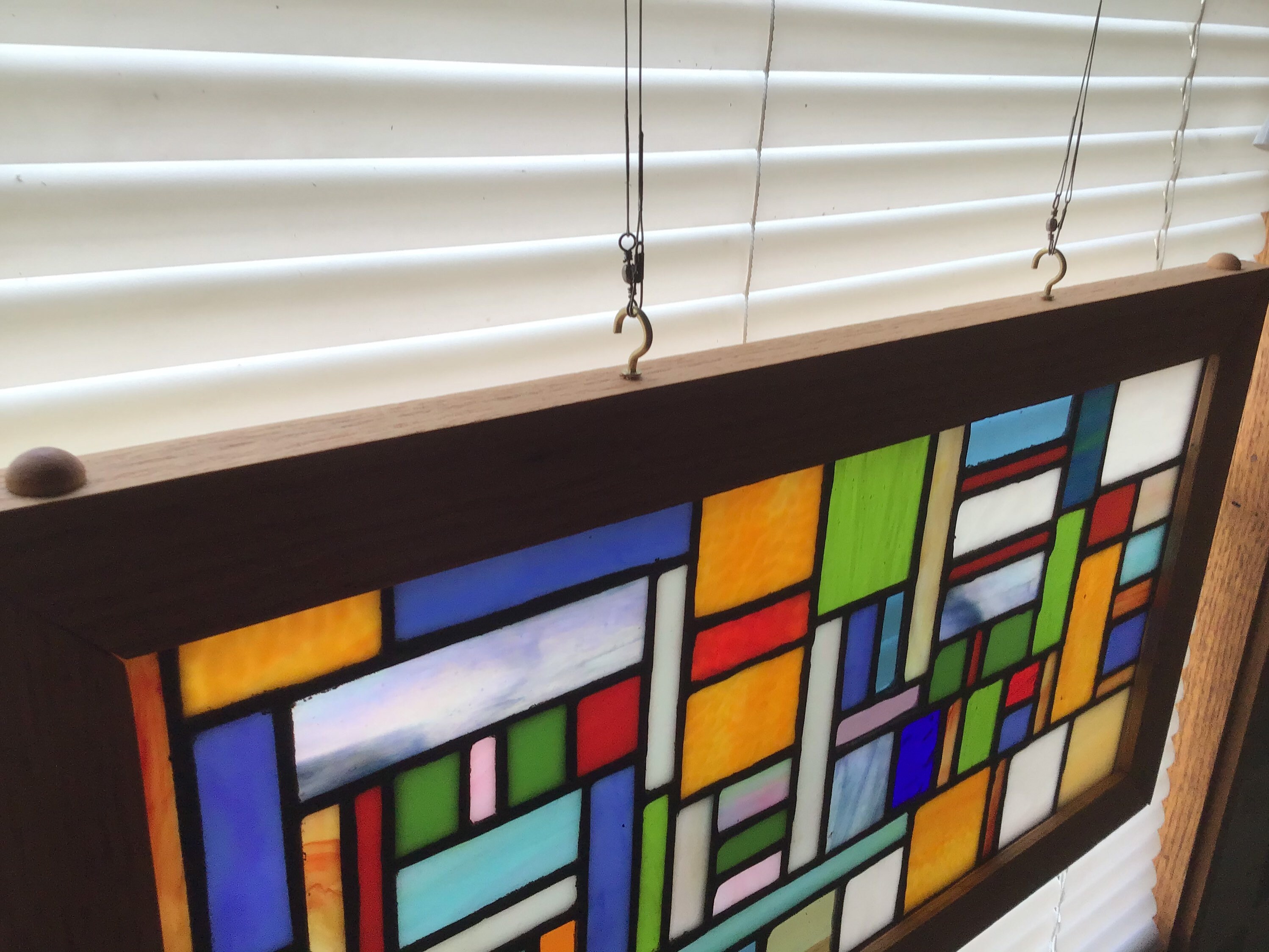 Stained glass panel mounted in a custom red oak wood frame Etsy
