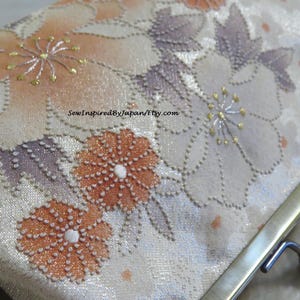 Cartera de mano nupcial en liquidación con nudos Sagara florales en color morado melocotón y obi japonés