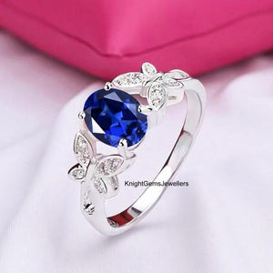 Blue Sapphire Butterfly Ring: Oval Gem, Sterling Silver Engagement