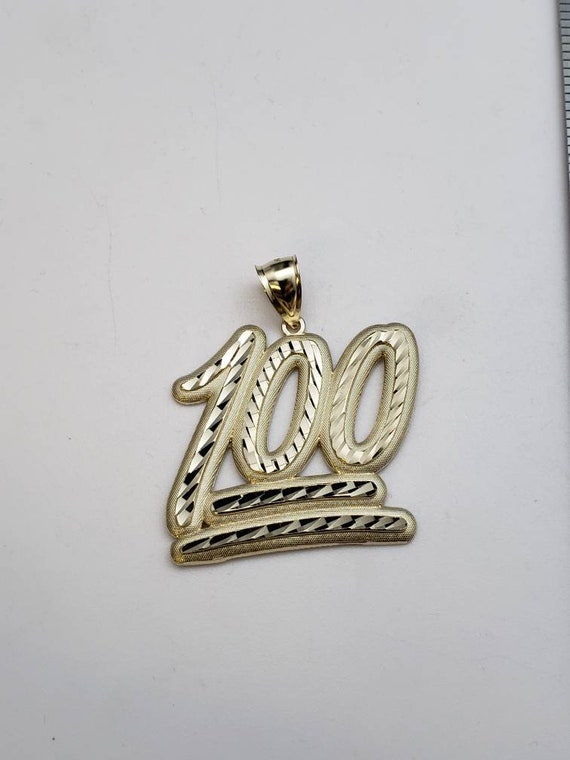 10k yellow gold 100 pendant