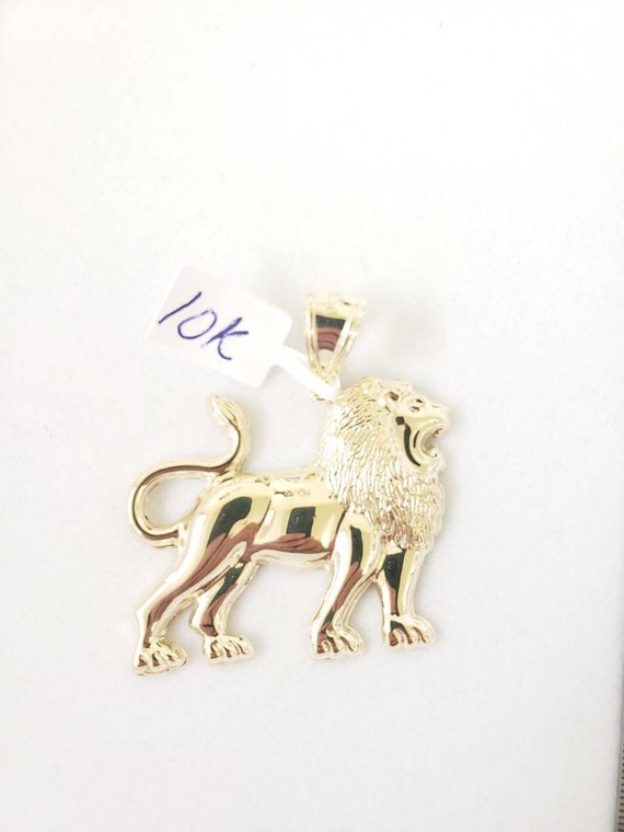 Gold lion pendant