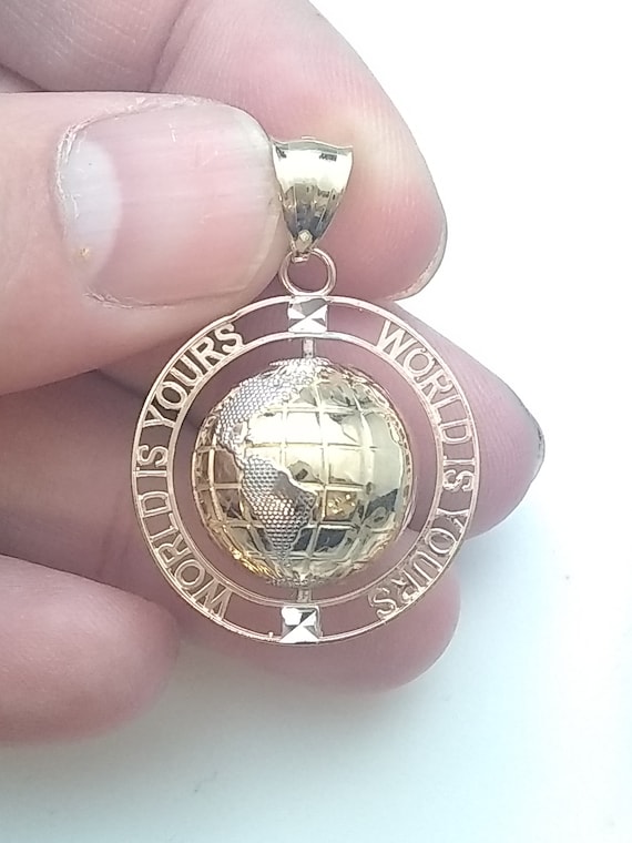 10k spinning world is yours pendant