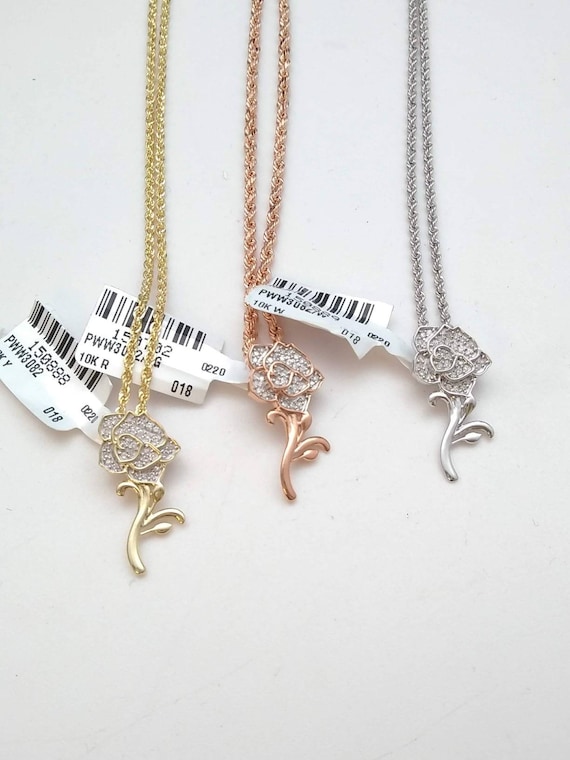 10k gold and diamond rose pendant.