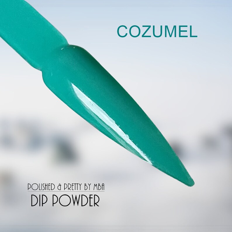 May include: A close-up of a teal green nail dip powder, with the text "COZUMEL" and "POLISHED & PRETTY BY MBA DIP POWDER" on the background.