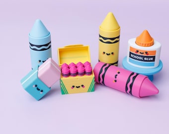 May include: A collection of school supply-themed erasers including a light blue crayon, a yellow crayon, a pink crayon, a blue eraser, a yellow box filled with eight small pink erasers, and a white glue bottle with the text SCHOOL GLUE.