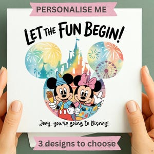May include: A square greeting card featuring the text "PERSONALIZE ME" at the top and "3 designs to choose" at the bottom. The center displays Mickey and Minnie Mouse with the text "LET THE FUN BEGIN!" and "Joey, you're going to Disney!" over a colorful castle and fireworks background.