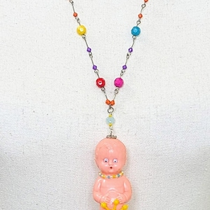 Unique vintage necklace with vintage doll pendant. Wee Willy Winky. Hard plastic.