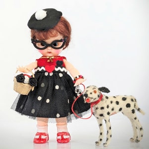 Small vintage Valentine doll. She wears an adorable, handcrafted outfit that matches vintage Kunstlerschutz dog.