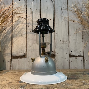 Paraffin outlet storm lantern