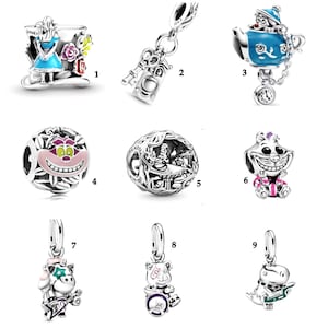 May include: A collection of silver charms featuring characters and elements from Alice in Wonderland. Charms include Alice, the Cheshire Cat, a teapot, a key, and other whimsical designs. These charms are ideal for bracelets or necklaces.