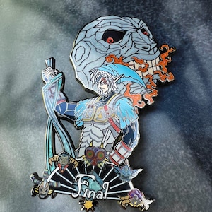 May include: Enamel pin featuring a character from a video game, with a blue and white color scheme. The pin includes a character holding a sword, a skull, and the word "Final".