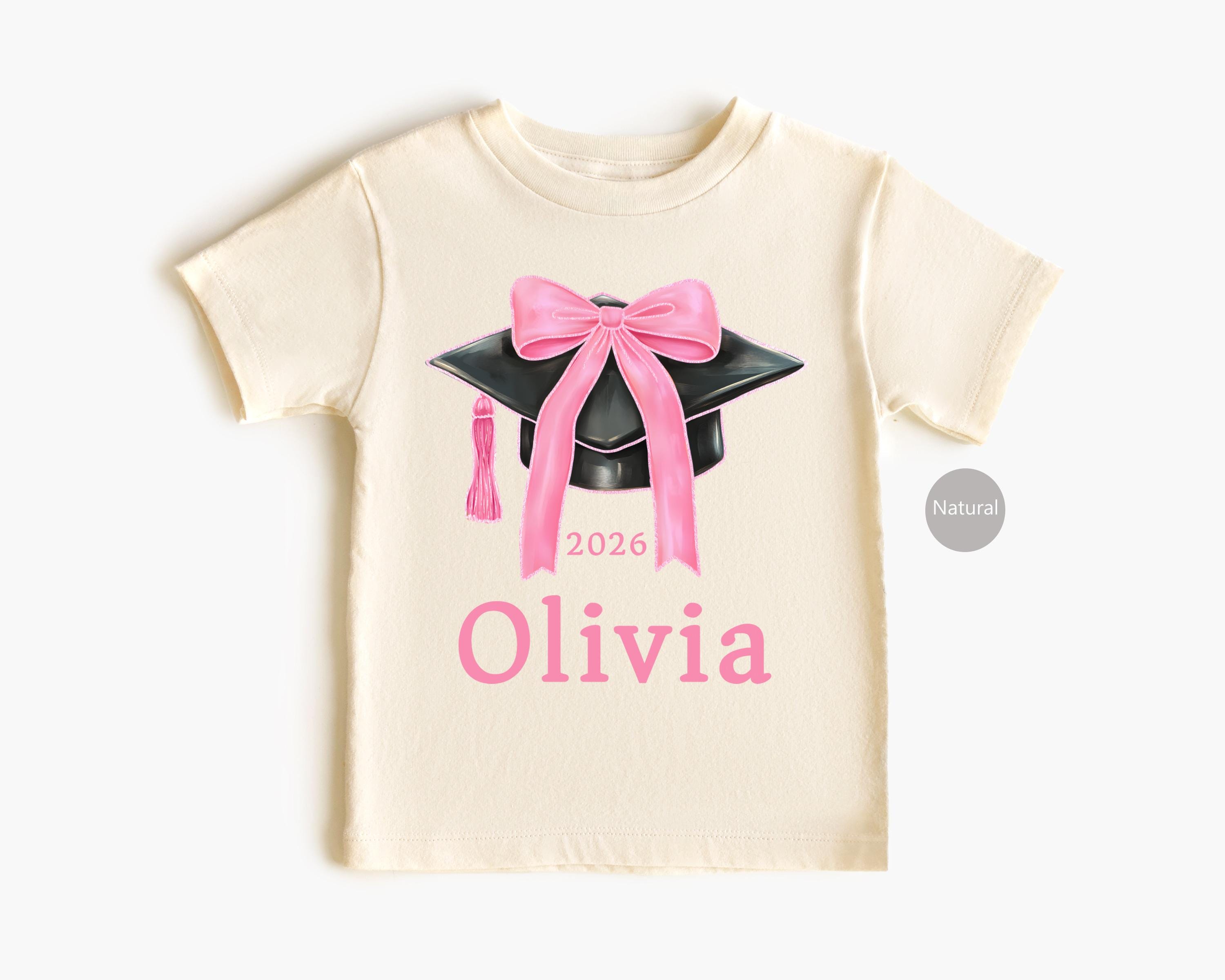 2026 Graduation T-Shirts, Personalized Grad Tee, Pink Coquette Bow Graduation Cap Shirt, Custom Senior Year Gift, Class of 2026 Apparel
