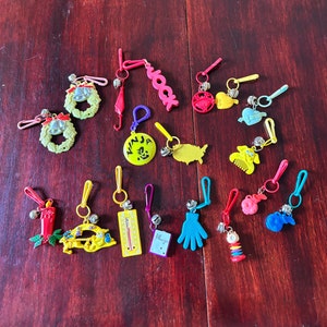 1980’s * Plastic Items and fun stuff Bell charms Charm clips necklace-80’s toys