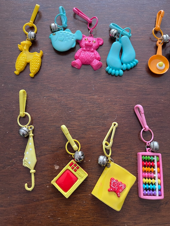 1980s Items Plastic Fun and Funky Bell Charms Charm Necklace-80s Toys 