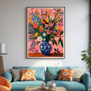 May include: A painting of a blue and white vase filled with a colorful bouquet of flowers. The flowers are arranged in a loose, natural style and include pink, yellow, orange, and red blooms. The background is a soft pink with a subtle floral pattern.