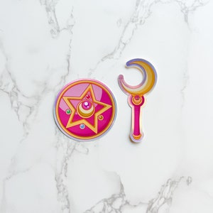 Magical girl decal with Crystal Star Brooch and Moon Stick wand from Sailor Moon anime. A thoughtful gift for Sailor Moon fans, anime lovers, and collectors.