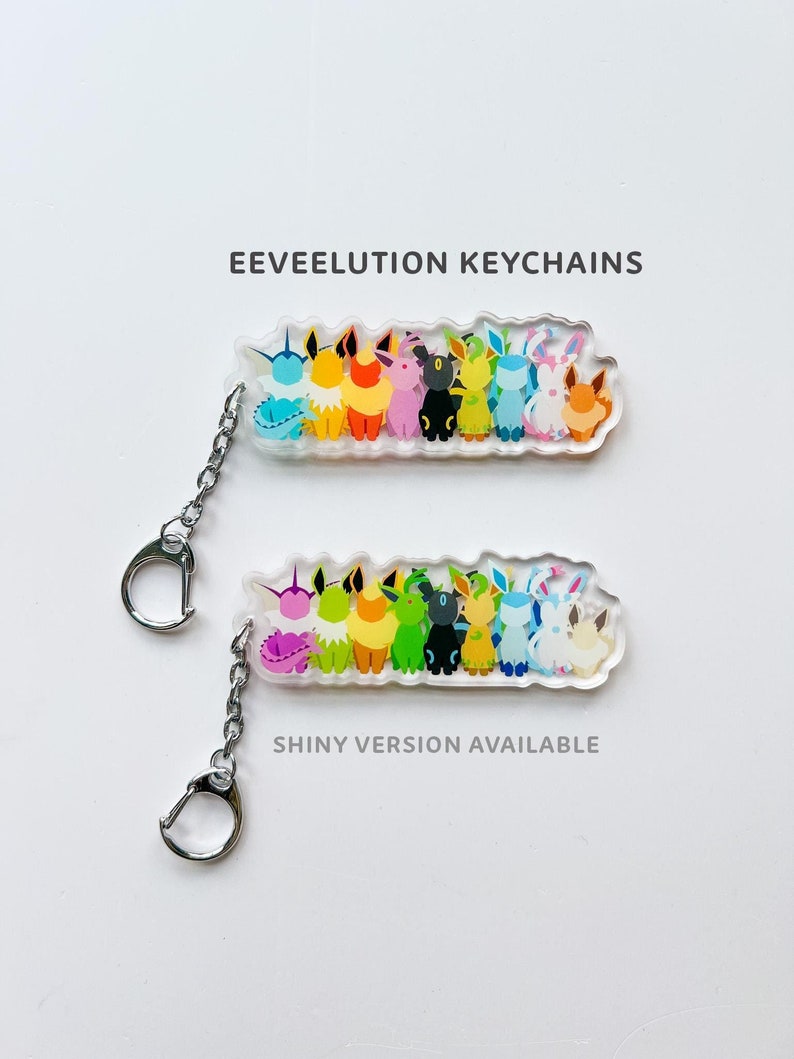 Eeveelution acrylic keychains, both normal and shiny Eevee options available. Featuring all the Eeveelutions: Flareon, Jolteon, Vaporeon, Umbreon, Espeon, Leafeon, Glaceon, and Sylveon with a metal clip on attachment.