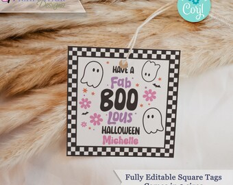 May include: A white square tag with a black and white checkered border. The tag has a pink and purple ghost design with the text "Have a Fab 800 Lous Halloween Michelle".