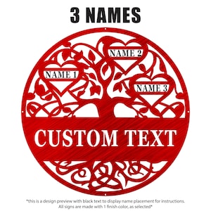 May include: A red metal family tree sign with the words "3 NAMES" at the top and "CUSTOM TEXT" at the bottom. The tree design includes three heart-shaped spaces for names. The sign is a decorative item.