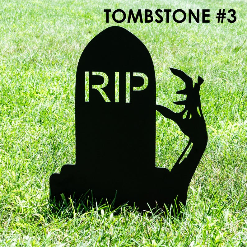 May include: Black tombstone silhouette with the letters "RIP" cut out, and a zombie hand reaching out. The tombstone is set in green grass, with the text "TOMBSTONE #3" at the top.