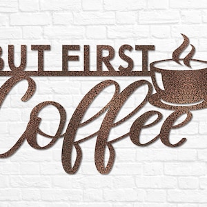 May include: Metal wall decor with the text "But First, Coffee" in a cursive font. A stylized coffee cup with steam rising from it is above the text.