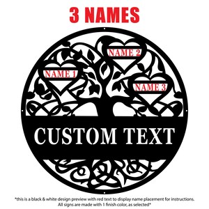 May include: Black metal family tree sign with three heart-shaped name placements and a space for custom text. The words "3 NAMES" are in red at the top. The design includes a tree silhouette and decorative swirls.
