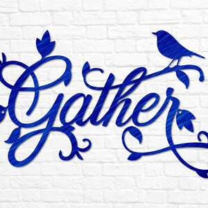 May include: Blue metal wall art featuring the word "Gather" in a decorative script font. The word is surrounded by stylised floral designs and a small blue bird perched on a branch.