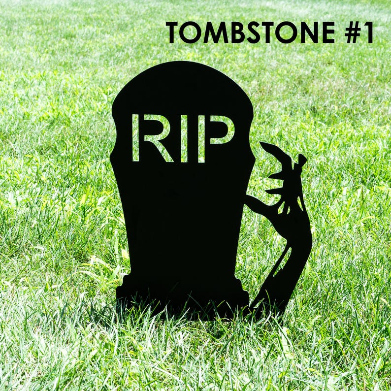 May include: Black metal tombstone silhouette with the word "RIP" cut out. A zombie hand reaches out from the side. The text "TOMBSTONE #1" is at the top. The tombstone is set in green grass.